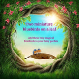 Bluebirds On A Leaf.