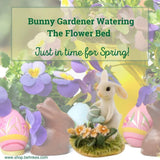 Bunny Gardener Watering the Flower Bed.