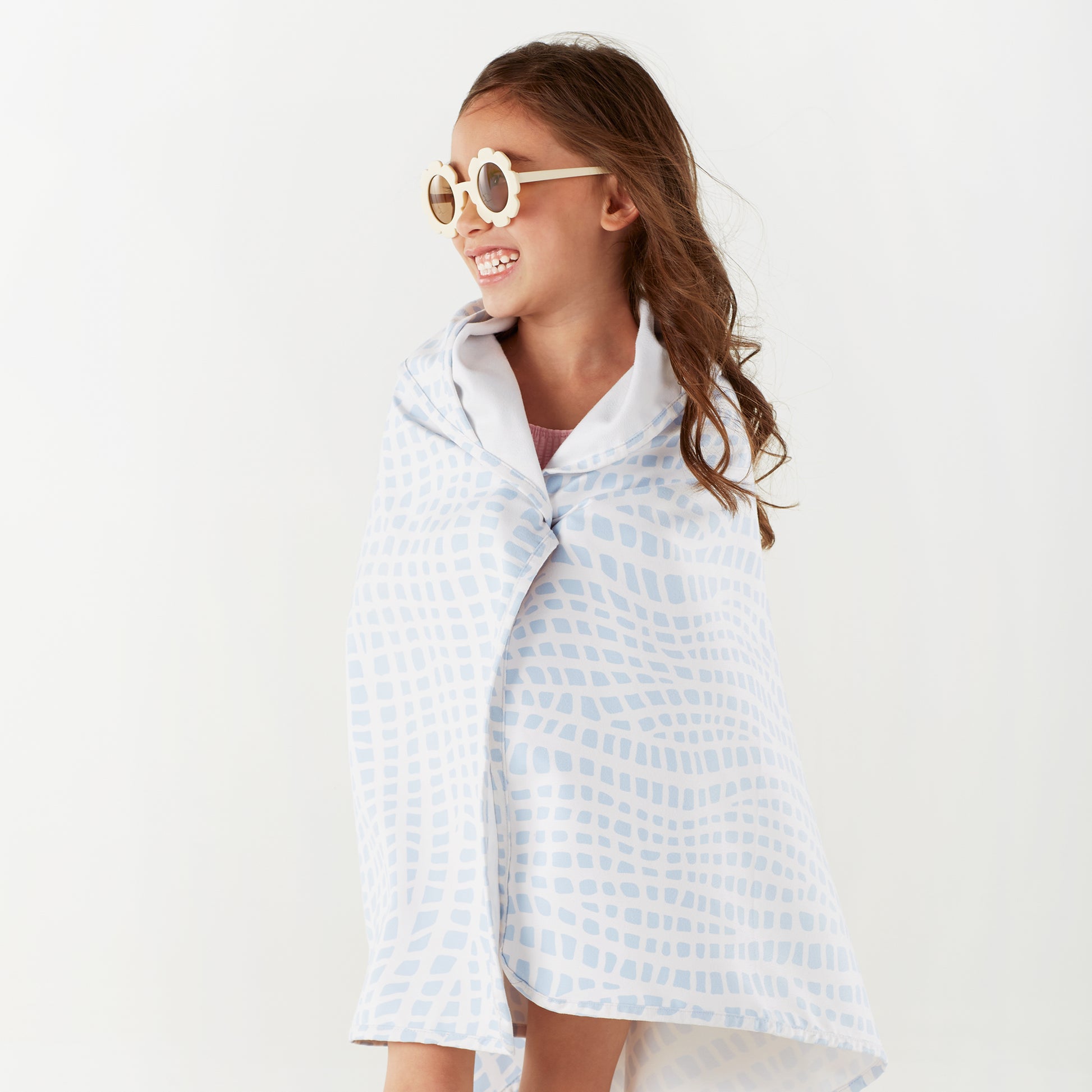 Norwex Kids Hooded Beach Towel - girl wrapped in Sea Turtle hooded towel smiling