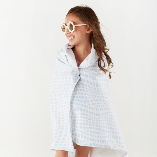 Norwex Kids Hooded Beach Towel - girl wrapped in Sea Turtle hooded towel smiling