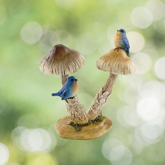 Bluebirds On Mushroom.